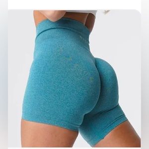 NVGTN pro shorts teal size medium